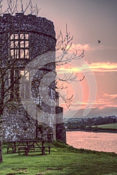 Carew Castle Pembrokeshire with the Millpond and Sunset