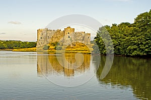 Carew castle in reflection