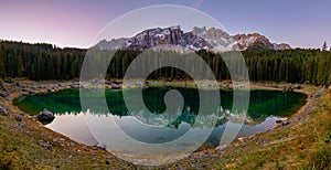 Carezza lake (Lago di Carezza, Karersee) with Mount Latemar, Bolzano province, South tyrol, Italy. photo