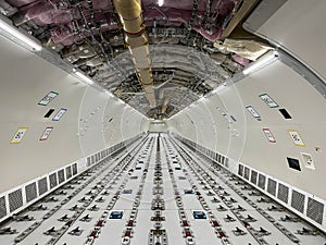 Cargo Airplane - view inside the main deck cargo compartment on a freshly converted wide-body freighter aircraft
