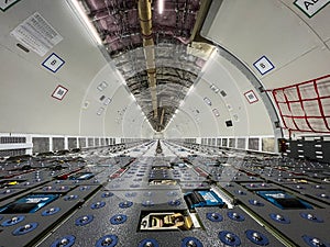 Cargo Airplane - view inside the main deck cargo compartment on a freshly converted wide-body freighter aircraft