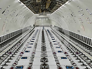 Cargo Airplane - view inside the main deck cargo compartment on a freshly converted wide-body freighter aircraft photo
