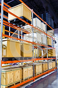 Cargo box on steel shelf system in warehouse