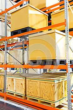 Cargo box on steel shelf system in warehouse