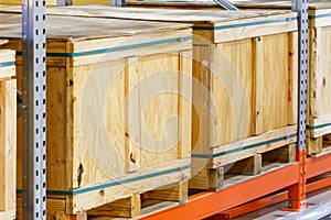 Cargo box on steel shelf system in warehouse