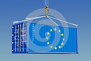 Cargo container with EU flag hanging on the crane hook against b