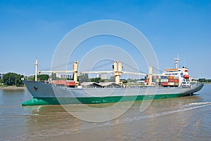 Cargo container ship on river