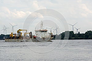 Cargo container ship sailing on the river