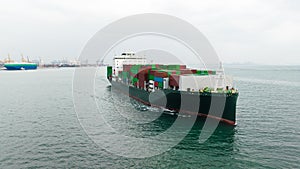 cargo container ship sailing in sea to import export goods and distributing products to dealer and consumers across worldwide, by