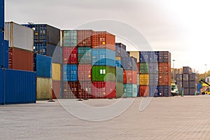 Cargo containers. Cargo container yard. Stack of freight containers at the docks.