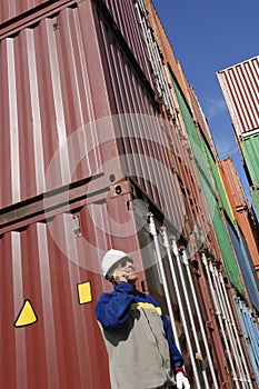 Cargo containers and dock worker photo