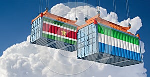 Cargo containers with Suriname and Sierra Leone national flags.