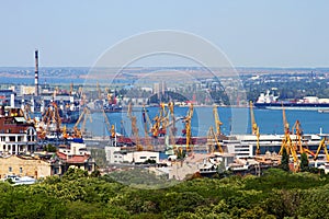 Cargo crane and grain dryer in port