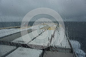 Cargo ferry voyage in a rainy day