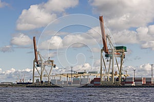 Cargo freight port with industrial cranes. Container ship in import and export business logistic industry and transportation