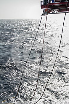 Cargo hoses in the sea from the oil platform