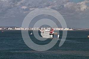 Cargo and passenger ferry goes to sea. Cadiz, Spain