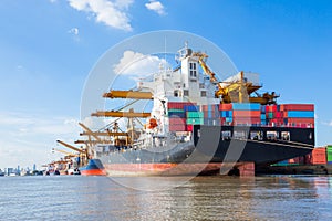 Cargo plane flying above ship port for logistic import export