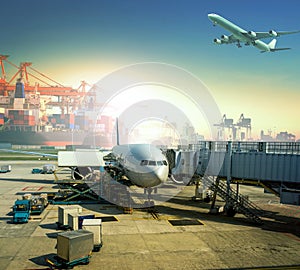 cargo plane loading commercial goods against large logistic ,shipping port background