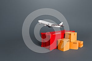 Cargo plane over container and boxes. Services of express delivery and transportation of goods by plane. World trade and logistics