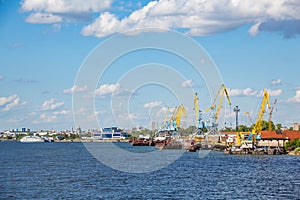 Cargo river port on the Volga River in the city of Kazan. Republic of Tatarstan, Russia. Ships at the docks