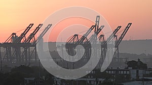 Cargo Sea Port Cranes. Cargo vessel shipping industry. Global import export freight transportation by cargo ship. Export