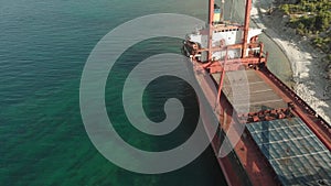 Cargo Ship aground at sea.