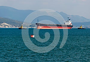 Cargo ship anchored in the roadstead Tsemes bay at the entrance of the port of Novorossiysk