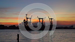 Cargo ship Chao phraya river twilight sunset