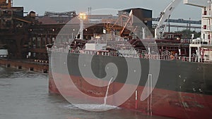 Cargo ship discharging ballast water