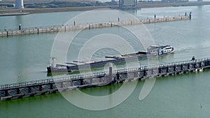 Cargo ship enters the Krammer locks, in The Netherlands