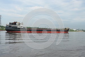 Cargo ship, large ship, cargo ship is on the river. Port city