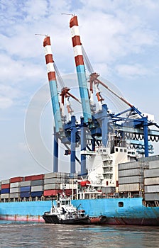 Cargo ship loading containers in Bremerhaven, Germany