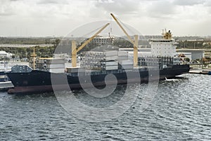 Cargo ship loading containers at the port of Fort Lauderdale, FL