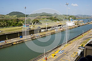 Cargo ship lowered in first lock at Panama Canal