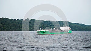Cargo ship moving along the Volga River