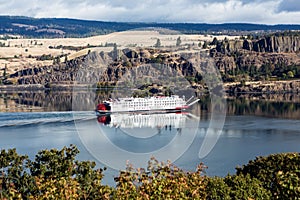 Cargo ship paddling upriver