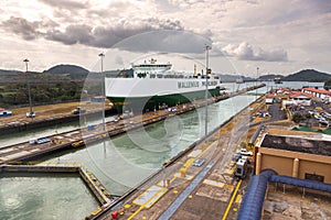 Cargo Ship Passing Through Miraflores Locks in Panama Canal