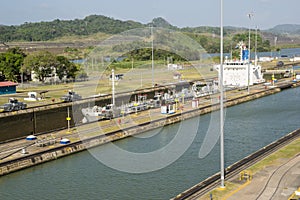 Cargo ship passing through Panama Canal