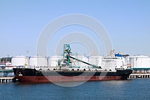 Cargo ship in port on loading