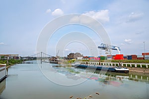 Cargo ship in port, river transport