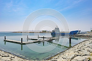 Cargo Ship in a Quiet Harbor