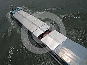 Cargo ship on a river