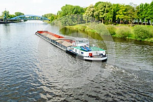 Cargo ship on a river