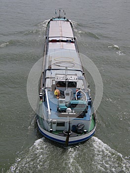 Cargo ship on a river - aerial view