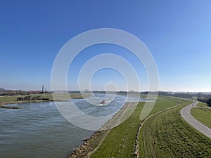 Cargo ship on the river Nederrijn around Heteren