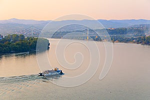 Cargo ship sailing on the river