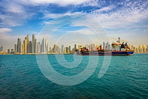Cargo ship sailing to the Dubai marina port