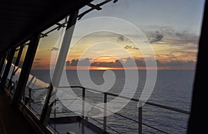 Cargo ship - sunset view from the navigational bridge.