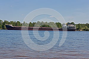 Cargo ship to transport wood on the river